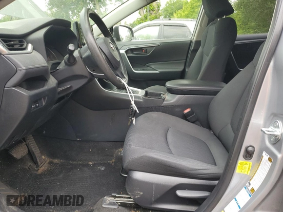 2019 Toyota RAV4 LE with VIN JTMG1RFV4KD004180, listed as a Copart auction lot 57127095 with 71,454 mi miles and Salvage title. Bid and sale history available at DreamBid. Image 7.