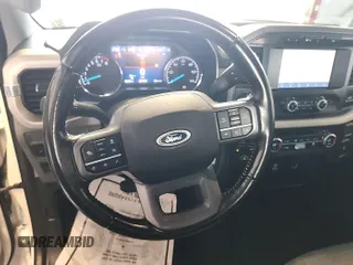 2021 Ford F-150 XL with VIN 1FTEX1EB3MKD86148, listed as a IAAI auction lot 42472083 with 128,964 mi miles and . Bid and sale history available at DreamBid. Image 1.