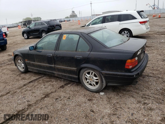 1998 BMW 3 Series 328iA with VIN WBACD4323WAV62464, listed as a Copart auction lot 66717014 with 0 mi miles and Clean Title. Bid and sale history available at carsss.com. Image 2.