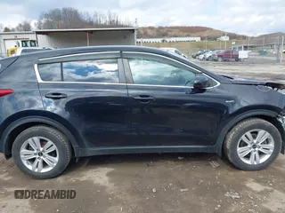 2018 Kia Sportage LX with VIN KNDPMCAC3J7380179, listed as a IAAI auction lot 41672067 with 134,390 mi miles. Bid and sale history available at carsss.com. Image 14.