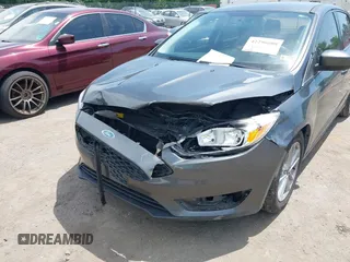 2018 Ford Focus SE with VIN 1FADP3FE2JL227679, listed as a IAAI auction lot 42296608 with 128,269 mi miles and . Bid and sale history available at DreamBid. Image 6.