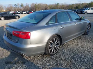 2015 Audi A6 Premium Plus z VIN WAUFGAFCXFN004840, wystawiony jako IAAI lot #41541257 z przebiegiem 163 050 mil mil oraz . Historia ofert i sprzedaży dostępna na DreamBid. Obrazek 4.