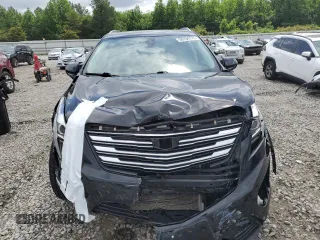 2019 Cadillac XT5 Luxury FWD с VIN 1GYKNCRS7KZ104400, выставлен на аукционе Copart как лот 58704715 с пробегом 80 676 миль миль и Списание • Salvage title. История ставок и продаж доступна на DreamBid. Изображение 5.