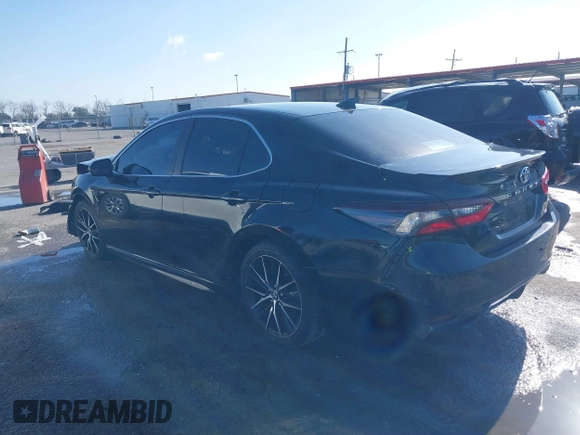 2021 Toyota Camry SE Nightshade with VIN 4T1G11AK5MU487725, listed as a IAAI auction lot 41196499 with 104,715 mi miles and . Bid and sale history available at DreamBid. Image 3.