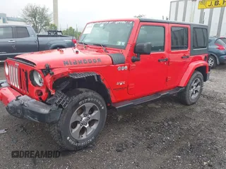 2017 Jeep Wrangler Unlimited Sahara with VIN 1C4HJWEG6HL609208, listed as a IAAI auction lot 42231634 with 87,466 mi miles and . Bid and sale history available at DreamBid. Image 2.