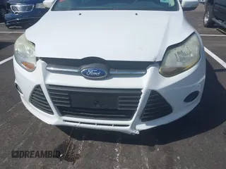 2014 Ford Focus SE z VIN 1FADP3K29EL387351, wystawiony jako IAAI lot #42167782 z przebiegiem 120 878 mil mil oraz . Historia ofert i sprzedaży dostępna na DreamBid. Obrazek 6.