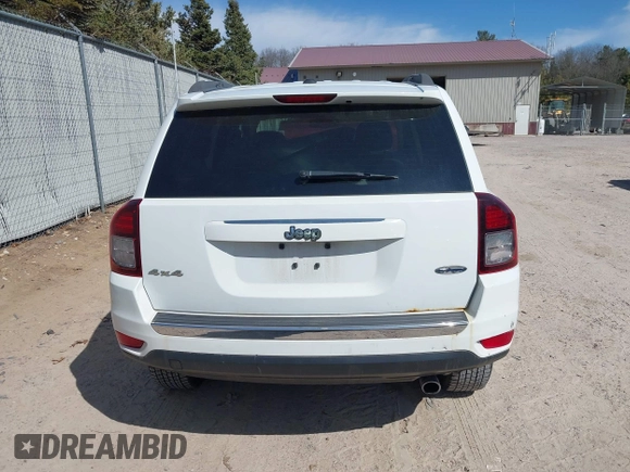 2016 Jeep Compass High Altitude with VIN 1C4NJDEB4GD767731, listed as a IAAI auction lot 41977400 with 99,890 mi miles and . Bid and sale history available at DreamBid. Image 16.