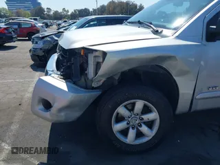 2012 Nissan Titan SV with VIN 1N6BA0EK5CN312092, listed as a IAAI auction lot 41881794 with 65,673 mi miles. Bid and sale history available at carsss.com. Image 6.