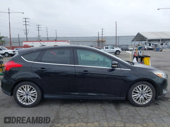 2017 Ford Focus Titanium with VIN 1FADP3N2XHL230766, listed as a IAAI auction lot 42386275 with 64,138 mi miles and . Bid and sale history available at DreamBid. Image 13.