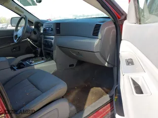 2006 Jeep Grand Cherokee Laredo with VIN 1J4HR48N56C112794, listed as a IAAI auction lot 42008002 with 207,065 mi miles. Bid and sale history available at carsss.com. Image 5.
