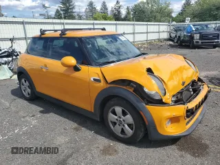 2016 MINI Hardtop with VIN WMWXP5C57G3B14701, listed as a Copart auction lot 58351545 with 111,647 mi miles and Salvage title. Bid and sale history available at DreamBid. Image 4.