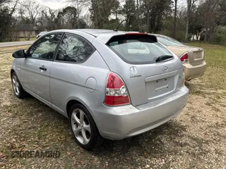 2007 Hyundai Accent SE with VIN KMHCN36C47U005847, listed as a Copart auction lot 46369725 with 148,790 mi miles and Clean Title. Bid and sale history available at carsss.com. Image 3.