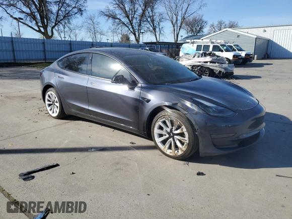 2022 Tesla Model 3 with VIN 5YJ3E1EAXNF360200, listed as a Copart auction lot 44463735 with 86,880 mi miles and Salvage Title. Bid and sale history available at DreamBid. Image 4.