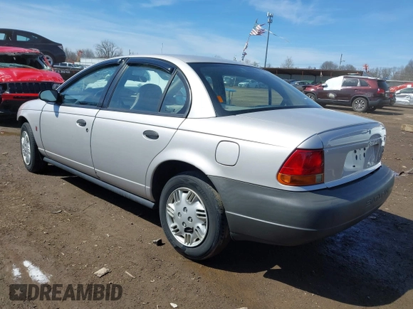 1999 Saturn SL z VIN 1G8ZH5281XZ376254, wystawiony jako IAAI lot #41857372 z przebiegiem 229 836 mil mil oraz . Historia ofert i sprzedaży dostępna na DreamBid. Obrazek 3.