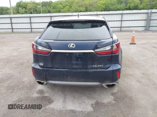 2016 Lexus RX 350 with VIN 2T2BZMCA1GC012079, listed as a IAAI auction lot 42265304 with 124,861 mi miles and . Bid and sale history available at DreamBid. Image 16.