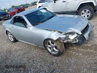 2001 Mercedes-Benz SLK 230/320 z VIN WDBKK65F81F191120, wystawiony jako IAAI lot #42173910 z przebiegiem 128 035 mil mil oraz . Historia ofert i sprzedaży dostępna na DreamBid. Obrazek 1.