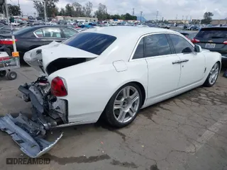2013 Rolls-Royce Ghost with VIN SCA664S56DUX51795, listed as a IAAI auction lot 41921013 with 70,988 mi miles. Bid and sale history available at carsss.com. Image 4.