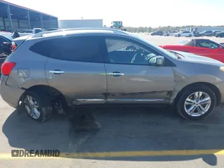 2012 Nissan Rogue S with VIN JN8AS5MT9CW277235, listed as a IAAI auction lot 41863602 with 116,153 mi miles and . Bid and sale history available at DreamBid. Image 13.