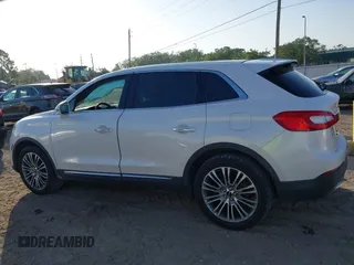 2016 Lincoln MKX Reserve with VIN 2LMTJ6LR4GBL75275, listed as a IAAI auction lot 41936550 with 76,177 mi miles. Bid and sale history available at carsss.com. Image 14.