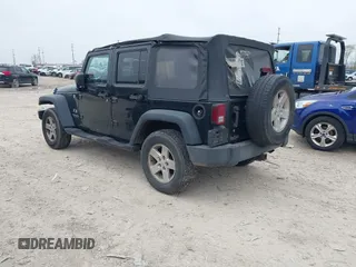 2007 Jeep Wrangler Unlimited X with VIN 1J4GA39177L153387, listed as a IAAI auction lot 42021211 with 207,965 mi miles and . Bid and sale history available at DreamBid. Image 3.