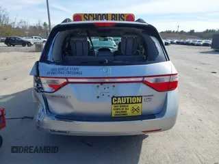 2012 Honda Odyssey Touring with VIN 5FNRL5H95CB063003, listed as a IAAI auction lot 41871975 with 179,332 mi miles and . Bid and sale history available at DreamBid. Image 16.