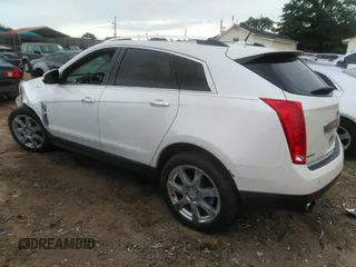 2012 Cadillac SRX Performance Collection z VIN 3GYFNBE32CS653172, wystawiony jako IAAI lot #42287435 z przebiegiem 161 065 mil mil oraz . Historia ofert i sprzedaży dostępna na DreamBid. Obrazek 3.