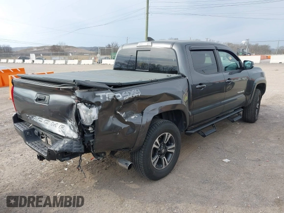 2018 Toyota Tacoma SR with VIN 3TMCZ5AN0JM150540, listed as a IAAI auction lot 41683174 with 78,553 mi miles and . Bid and sale history available at DreamBid. Image 4.