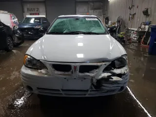 2002 Pontiac Grand Am SE1 with VIN 1G2NF52E92C309398, listed as a Copart auction lot 87854945 with 57,468 mi miles and Salvage Title. Bid and sale history available at carsss.com. Image 5.