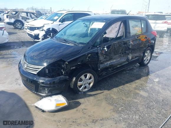 2012 Nissan Versa S with VIN 3N1BC1CP8CK271046, listed as a IAAI auction lot 41318997 with 138,111 mi miles. Bid and sale history available at carsss.com. Image 21.