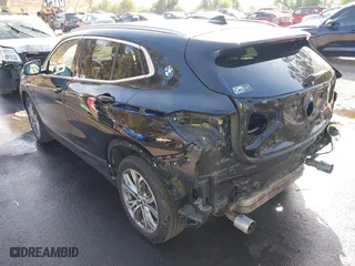 2019 BMW X2 xDrive28i with VIN WBXYJ5C52K5N24828, listed as a IAAI auction lot 41155049 with 59,597 mi miles. Bid and sale history available at carsss.com. Image 3.