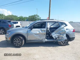 2020 Volkswagen Tiguan SE with VIN 3VV3B7AX8LM077472, listed as a IAAI auction lot 41933521 with 52,028 mi miles and . Bid and sale history available at DreamBid. Image 14.