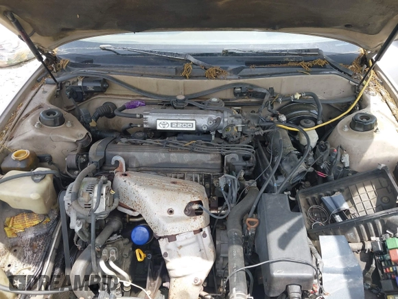 1996 Toyota Camry DX z VIN 4T1BG12K6TU752299, wystawiony jako IAAI lot #42239717 z przebiegiem 365 814 mil mil oraz . Historia ofert i sprzedaży dostępna na DreamBid. Obrazek 10.