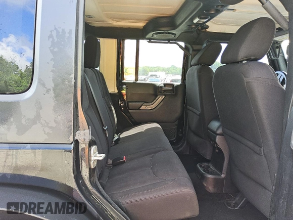 2013 Jeep Wrangler Unlimited Sport z VIN 1C4BJWDG3DL658674, wystawiony jako Copart lot #54851685 z przebiegiem 113 852 mil mil oraz Czysty tytuł • Clean title. Historia ofert i sprzedaży dostępna na DreamBid. Obrazek 10.
