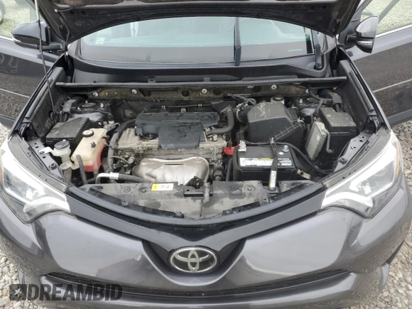 2018 Toyota RAV4 SE with VIN JTMJFREV2JJ730077, listed as a Copart auction lot 56666055 with 85,100 mi miles and Salvage title. Bid and sale history available at DreamBid. Image 12.