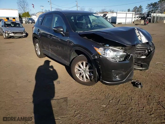 2016 Mazda CX-5 Touring with VIN JM3KE4CY7G0815137, listed as a Copart auction lot 50444665 with 61,681 mi miles and Salvage Title. Bid and sale history available at carsss.com. Image 11.
