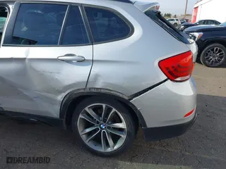 2014 BMW X1 sDrive28i with VIN WBAVM1C58EVW52847, listed as a IAAI auction lot 40779553 with 151,076 mi miles. Bid and sale history available at carsss.com. Image 6.