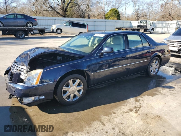 2006 Cadillac DTS 1SB z VIN 1G6KD57Y56U220535, wystawiony jako Copart lot #89196185 z przebiegiem 94 312 mil mil oraz Szkoda całkowita • Salvage title. Historia ofert i sprzedaży dostępna na DreamBid. Obrazek 1.