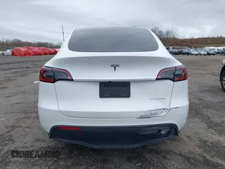 2023 Tesla Model Y Long Range with VIN 7SAYGDEEXPF684287, listed as a IAAI auction lot 41961230 with 45,080 mi miles and . Bid and sale history available at carsss.com. Image 16.