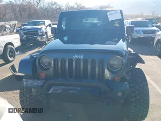 2008 Jeep Wrangler Sahara with VIN 1J4FA54108L543764, listed as a IAAI auction lot 41867734 with 186,145 mi miles and . Bid and sale history available at DreamBid. Image 13.