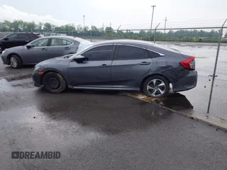 2019 Honda Civic Sedan LX with VIN 2HGFC2F60KH537797, listed as a IAAI auction lot 42119603 with 1 mi miles. Bid and sale history available at carsss.com. Image 13.