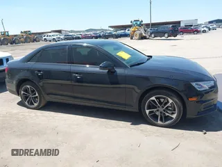 2019 Audi A4 Premium z VIN WAUGMAF49KN014940, wystawiony jako IAAI lot #41962088 z przebiegiem 69 099 mil mil oraz . Historia ofert i sprzedaży dostępna na DreamBid. Obrazek 13.