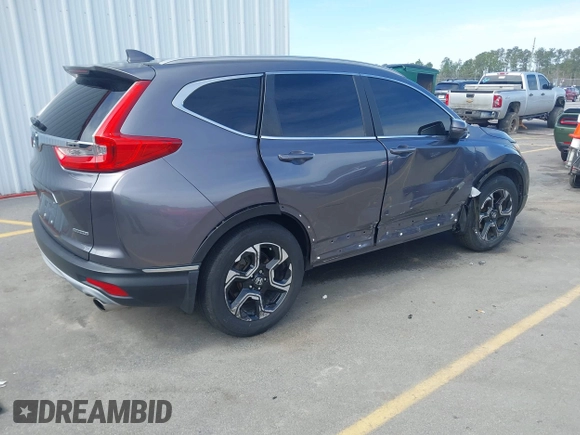 2018 Honda CR-V Touring with VIN 7FARW1H9XJE018575, listed as a IAAI auction lot 41747192 with 83,699 mi miles and . Bid and sale history available at carsss.com. Image 4.