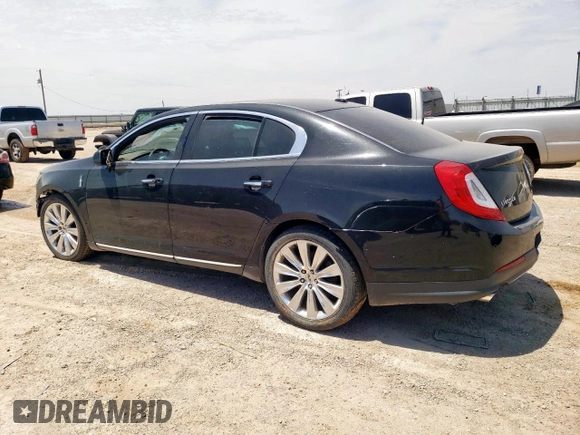 2013 Lincoln MKS EcoBoost with VIN 1LNHL9FT5DG606208, listed as a Copart auction lot 59224735 with 156,202 mi miles and Salvage title. Bid and sale history available at DreamBid. Image 2.