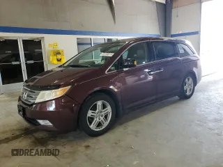 2013 Honda Odyssey Touring with VIN 5FNRL5H95DB035557, listed as a Copart auction lot 65150615 with 188,961 mi miles and Salvage title. Bid and sale history available at DreamBid. Image 1.