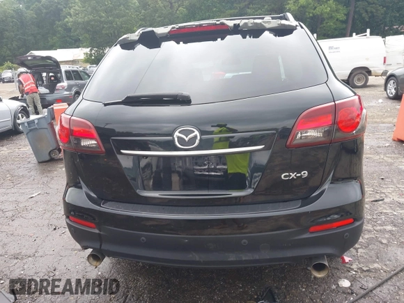 2015 Mazda CX-9 Grand Touring with VIN JM3TB2DA1F0464517, listed as a IAAI auction lot 42484985 with 104,932 mi miles and . Bid and sale history available at DreamBid. Image 17.