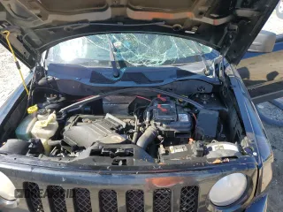 2014 Jeep Patriot Altitude z VIN 1C4NJPBA5ED848165, wystawiony jako Copart lot #56817635 z przebiegiem 150 174 mil mil oraz Szkoda całkowita • Salvage title. Historia ofert i sprzedaży dostępna na DreamBid. Obrazek 12.