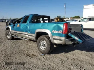 1998 GMC Sierra 2500 z VIN 1GTGK29RXWE507912, wystawiony jako Copart lot #67655674 z przebiegiem 165 538 mil mil oraz Szkody całkowita. Historia ofert i sprzedaży dostępna na DreamBid. Obrazek 2.