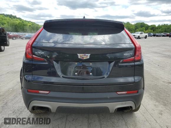 2020 Cadillac XT4 FWD Premium Luxury with VIN 1GYFZCR46LF113499, listed as a Copart auction lot 57534205 with 64,859 mi miles and Salvage title. Bid and sale history available at DreamBid. Image 6.