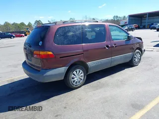1999 Toyota Sienna LE with VIN 4T3ZF13C1XU112717, listed as a IAAI auction lot 41725827 with 272,639 mi miles. Bid and sale history available at carsss.com. Image 4.