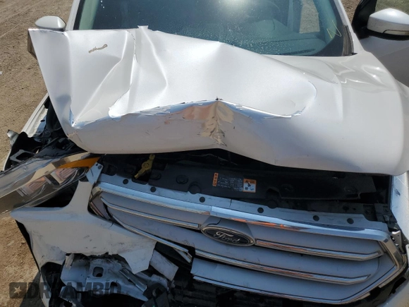 2019 Ford Escape Titanium z VIN 1FMCU9J93KUA51020, wystawiony jako Copart lot #60462495 z przebiegiem 59 998 mil mil oraz Szkoda całkowita • Salvage title. Historia ofert i sprzedaży dostępna na DreamBid. Obrazek 11.
